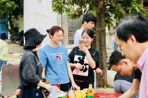 Reshin 2023 farmhouse team building event, employees interacting outdoors