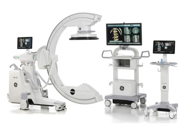 Mobile C-arm fluoroscopy system with integrated cart console and dual medical displays for interventional imaging workflows.Mobile C-arm fluoroscopy system with integrated cart console and dual medical displays for interventional imaging workflows.