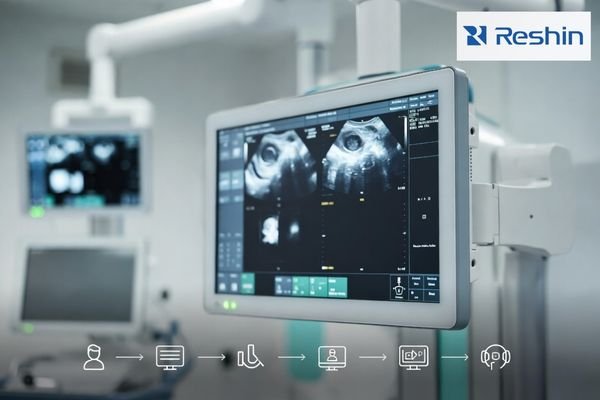 Medical-grade diagnostic monitor in a radiology setting displaying generic imaging, with a subtle HL7 workflow icon strip centered at the bottom.