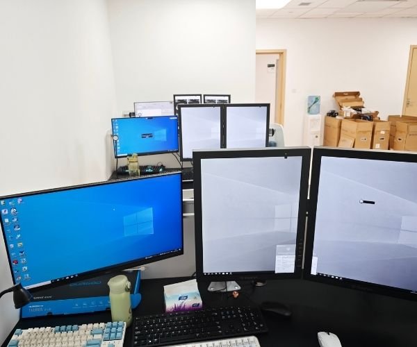 Multi-monitor radiology workstation illustrating different diagnostic display roles within one workstation environment